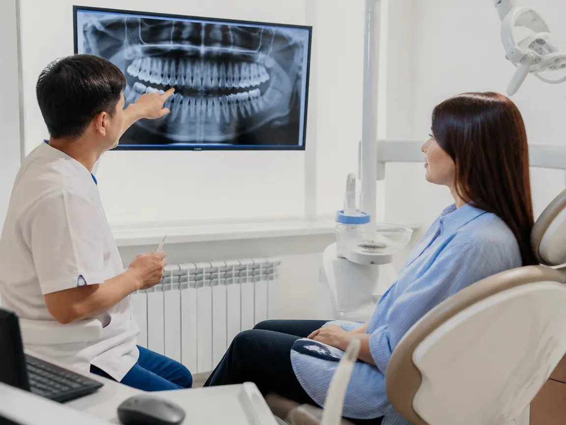 Consultation: doctor and patient at a screen with an X-ray — illustration for the section "Consultation and examination"