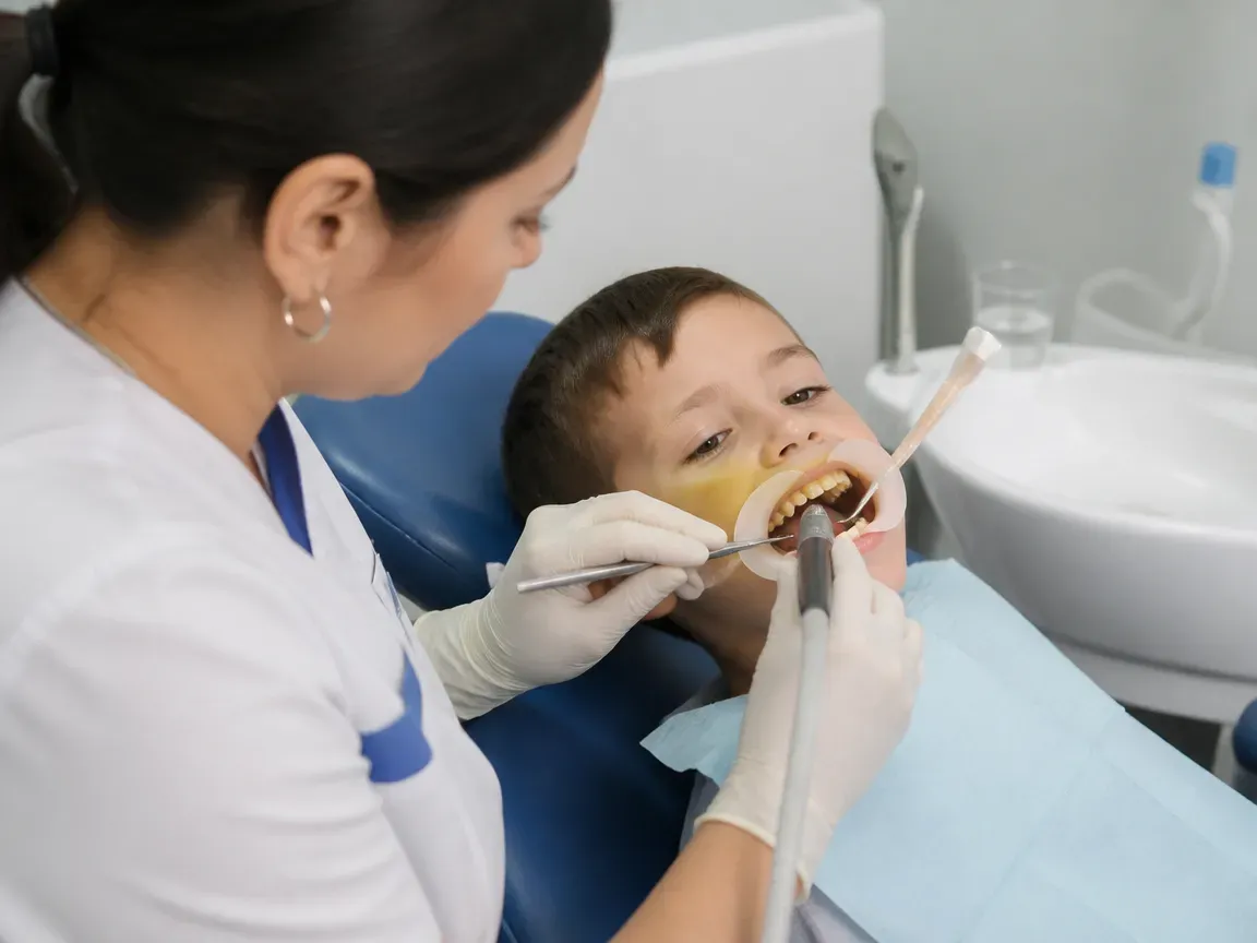 The treatment stage itself: the doctor's gloved hands working in the oral cavity — an illustration for the section "Preparation for Prosthetics"